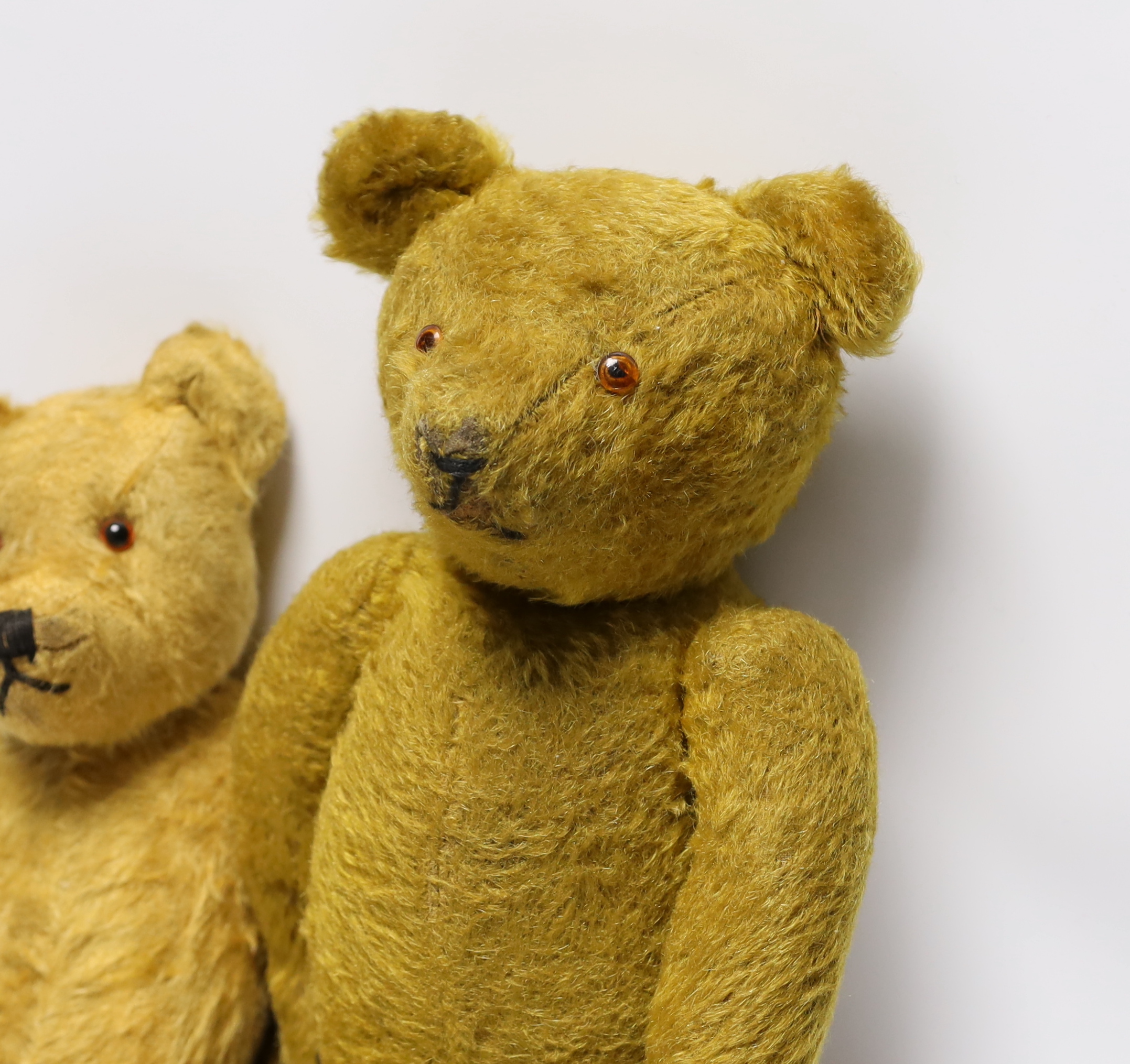 A 1930's German bear with 'set in' ears and a 1950's English Chiltern bear (2)